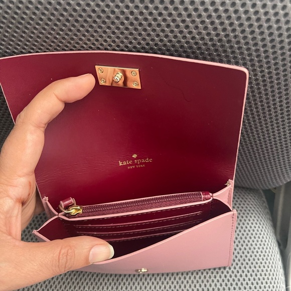 Gently used Dusty pink/purple wallet with silver hardware and burgundy interior. - Picture 4 of 7